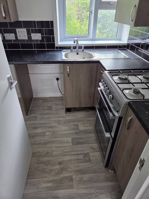 Build and maintenance work: Kitchen, Units, worktops, tiling and flooring